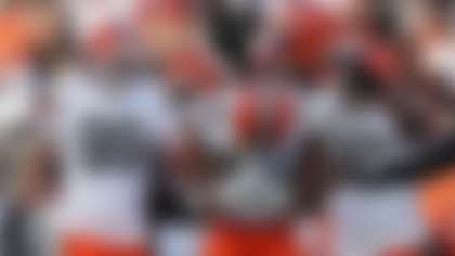 Cleveland Browns defensive end Myles Garrett (95) celebrates with teammates after sacking Cincinnati Bengals quarterback Joe Burrow to set an NFL record for sacks in the regular season during the second half of an NFL football game, Sunday, Jan. 4, 2026, in Cincinnati. (AP Photo/Joshua A. Bickel)