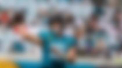 Jacksonville Jaguars quarterback Trevor Lawrence (16) throws a touchdown pass in the third quarter of an NFL football game against the Cleveland Browns in Jacksonville, Fla., Sunday, Sept. 13, 2026. (AP Photo/Gary McCullough)