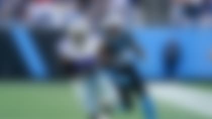 Dallas Cowboys cornerback DaRon Bland intercepts a pass intended for Carolina Panthers wide receiver Jonathan Mingo during the second half of an NFL football game Sunday, Nov. 19, 2023, in Charlotte, N.C. Bland scored n the play. (AP Photo/Erik Verduzco)