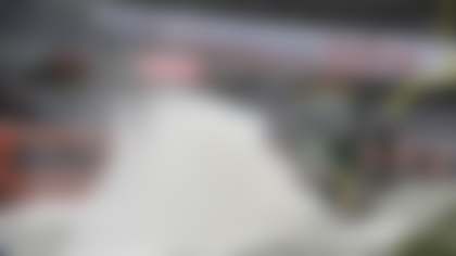 Workers clear snow from Soldier Field before an NFL football game between the Chicago Bears and Cleveland Browns in Chicago, Sunday, Dec. 24, 2017. (AP Photo/Nam Y. Huh)