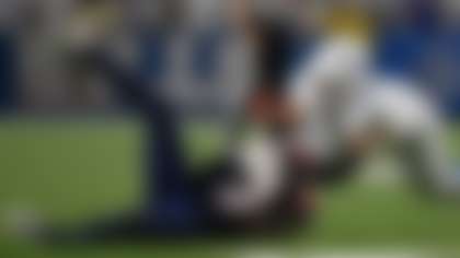 New England Patriots wide receiver Stefon Diggs, left, is hit by Buffalo Bills linebacker Terrel Bernard, right, after a catch during the second half of an NFL football game, Sunday, Sept. 5, 2025, in Orchard Park, N.Y. (AP Photo/Adrian Kraus)