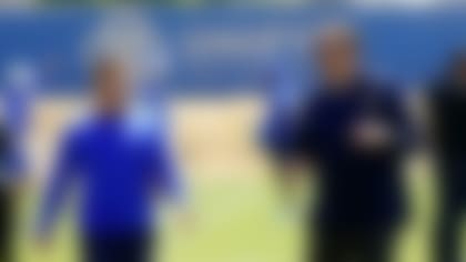 Los Angeles Rams offensive coordinator Liam Coen, right, smiles next to head coach Sean McVay at the NFL football team's practice facility Monday, May 23, 2022, in Thousand Oaks, Calif. (AP Photo/Marcio Jose Sanchez)