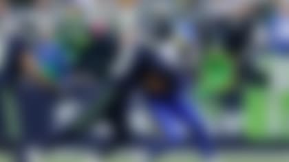 Los Angeles Rams tight end Colby Parkinson (84) is tackled by Seattle Seahawks linebacker Ernest Jones IV (13) during the NFC Championship NFL football game, Sunday, Jan. 25, 2026, in Seattle. (AP Photo/John Froschauer)