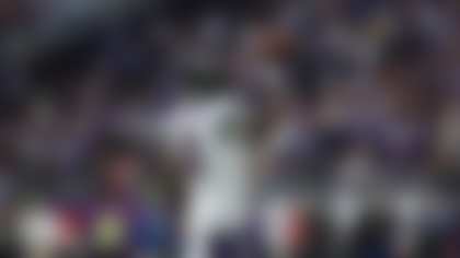 Baltimore Ravens quarterback Lamar Jackson holds the ball after a play against the Minnesota Vikings during the second half of an NFL football game Sunday, Nov. 9, 2025 in Minneapolis. Baltimore won 27-19. (AP Photo/Stacy Bengs)