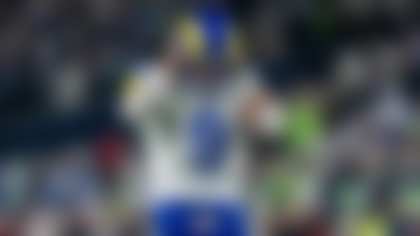 Los Angeles Rams quarterback Matthew Stafford listens for a play call during the NFC Championship football game against the Seattle Seahawks, Sunday, Jan. 25, 2026, in Seattle. (AP Photo/Stephen Brashear)