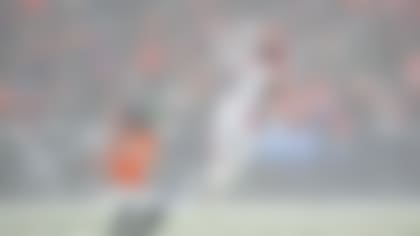 New England Patriots cornerback Christian Gonzalez (0) intercepts the ball in the fourth quarter against the Denver Broncos during the AFC Championship NFL football game, Sunday, Jan. 25, 2026 in Denver. (AP Photo/Bart Young)