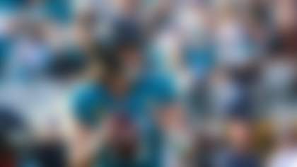 Jacksonville Jaguars quarterback Trevor Lawrence (16) looks downfield during an NFL football game against the New York Jets, Sunday, Dec. 14, 2025, in Jacksonville, Fla. The Jaguars defeated the Jets 48-20. (AP Photo/Gary McCullough)