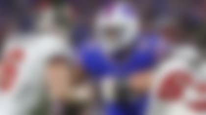 Buffalo Bills defensive end Greg Rousseau (50) puts pressure on Tampa Bay Buccaneers quarterback Baker Mayfield (6) during an NFL football game, Thursday, Oct. 26, 2023, in Orchard Park, N.Y. The Bills defeated the Buccaneers 24-18. (AP Photo/Gary McCullough)