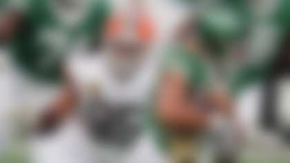 Cleveland Browns defensive end Myles Garrett (95) sacks New York Jets quarterback Justin Fields, right, in the first half of an NFL football game Sunday, Nov. 9, 2025, in East Rutherford, N.J. (AP Photo/Seth Wenig)