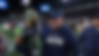 Seattle Seahawks head coach Mike Macdonald talks with safety Julian Love (20) after NFL football divisional playoff game against the San Francisco 49ers, Saturday, Jan. 17, 2026, in Seattle. (AP Photo/Lindsey Wasson)