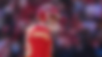 Kansas City Chiefs quarterback Patrick Mahomes walks to the huddle during the first half of an NFL football game against the Los Angeles Chargers, Sunday, Dec. 14, 2025, in Kansas City, Mo. (AP Photo/Charlie Riedel)