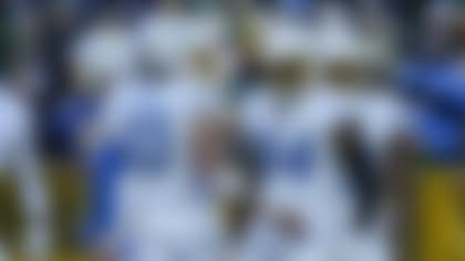 Los Angeles Chargers tight end Stone Smartt (84) celebrates his first half touchdown with quarterback Justin Herbert (10) during an NFL football game against the Green Bay Packers, Sunday, Nov. 19, 2023, in Green Bay, Wis. (AP Photo/Morry Gash)