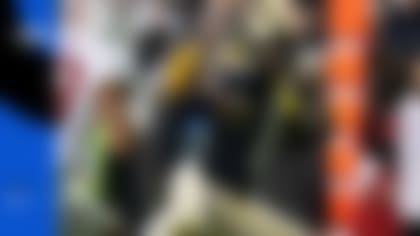 A dynamic playmaker for Colorado as a receiver and cornerback, Travis Hunter logged the most regular-season snaps from scrimmage of any FBS player during the 2023 campaign. (David Zalubowski/AP)