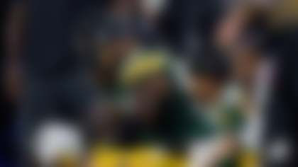 Green Bay Packers defensive end Rashan Gary (52) looks on from the bench during an NFL football game between the Dallas Cowboys and the Green Bay Packers Sunday, Sept. 28, 2025, in Arlington, Texas. (AP Photo/Julio Cortez)