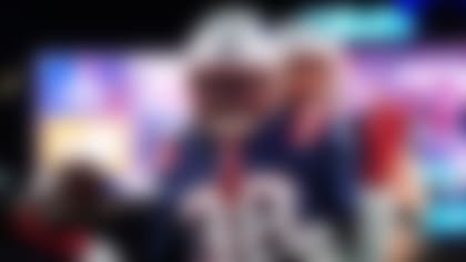 New England Patriots running back Rhamondre Stevenson celebrates after scoring a touchdown during the second half of an NFL football game against the Miami Dolphins in Foxborough, Mass., Sunday, Jan. 4, 2026. (AP Photo/Robert F. Bukaty)