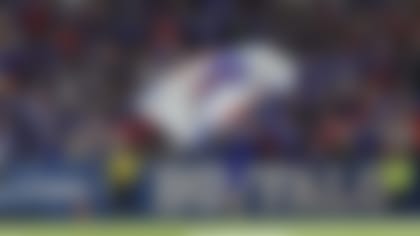 Mostly Buffalo Bills cheer squad runs across the endzone with a flag to celebrate a score during an NFL football game against the Tampa Bay Buccaneers, Thursday, Oct. 26, 2023, in Orchard Park, N.Y. (AP Photo/Gary McCullough)