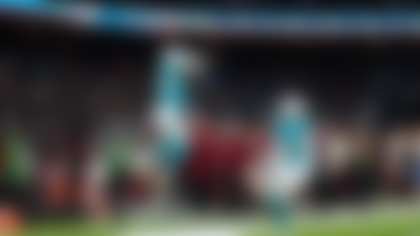 Miami Dolphins cornerback Jack Jones (23) makes a catch during an NFL football game against the Washington Commanders on Sunday, Nov. 16, 2025 in Madrid. (Robby Illanes/Miami Dolphins via AP)