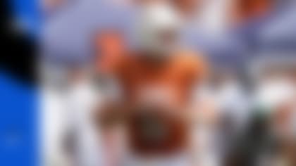 Texas quarterback Quinn Ewers threw for 300-plus yards six times last season, tying a program single-season record, and ranked 12th in the FBS with 289.9 passing yards per game. (Eric Gay/AP)