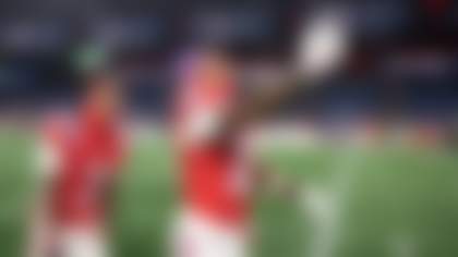 New England Patriots wide receiver Kyle Williams (18) and wide receiver DeMario Douglas (3) take a selfie after winning an NFL football game against the New York Giants, Monday, Dec. 1, 2025, in Foxborough, Mass. (Kathryn Riley via AP)