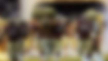 The San Francisco 49ers enter the field at the Azteca Stadium in Mexico City, Mexico on Sunday Oct. 2, 2005 prior to the game against the Arizona Cardinals in the first regular-season NFL game outside the United States in the league's 86-year history. (AP Photo/Dario Lopez-Mills)