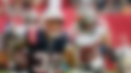 New England Patriots running back Treveyon Henderson (32) gains yards during an NFL football game against the Tampa Bay Buccaneers, Sunday, Nov. 9, 2025, in Tampa, Fla. (AP Photo/Jason Behnken)