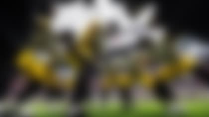 Pittsburgh Steelers linebacker T.J. Watt (90) is seen in the team huddle during pregame warmups prior to an NFL football game against the Houston Texans, Sunday, Oct. 1, 2023, in Houston. The Texans defeated the Steelers, 30-6. (Ryan Kang via AP)