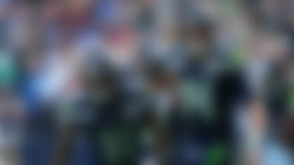 Seattle Seahawks wide receiver Jaxon Smith-Njigba (11) celebrates with quarterback Sam Darnold (14) after catching a touchdown pass against the Arizona Cardinals during an NFL football game Sunday, Nov. 9, 2025, in Seattle. (AP Photo/Lindsey Wasson)