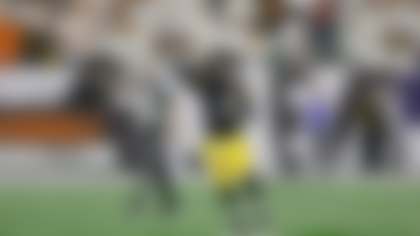 Pittsburgh Steelers quarterback Aaron Rodgers (8) passes the football on the run during an NFL football game against the Cincinnati Bengals, Thursday, Oct. 16, 2025, in Cincinnati. (Scott Boehm via AP)