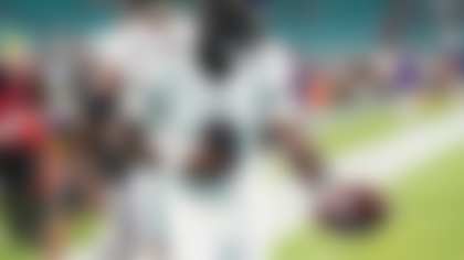 Baltimore Ravens quarterback Lamar Jackson adjusts his helmet before an NFL football game against the Miami Dolphins, Thursday, Oct. 30, 2025, in Miami Gardens, Fla. (AP Photo/Lynne Sladky)