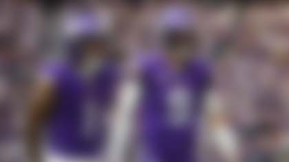 Minnesota Vikings wide receiver Jalen Nailor (1), left, and quarterback J.J. McCarthy (9) celebrate after running back Jordan Mason (27) scored a touchdown during the second half of an NFL football game against the Chicago Bears, Sunday, Nov. 16, 2025, in Minneapolis. (AP Photo/Matt Krohn)