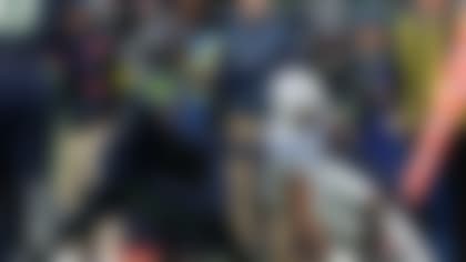 Indianapolis Colts wide receiver Josh Downs (2) tries to get past Seattle Seahawks safety Nick Emmanwori (3) during the first half of an NFL football game Sunday, Dec. 14, 2025, in Seattle. (AP Photo/Lindsey Wasson)