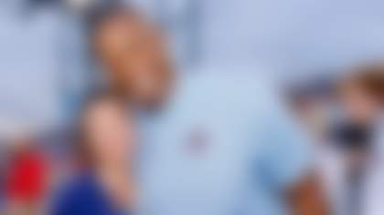 Rojas poses with Chargers legend and Hall of Fame tight end Antonio Gates in Canton, Ohio. Rojas has been with the franchise since summer of 2001. (Photo courtesy of Jennifer Rojas)