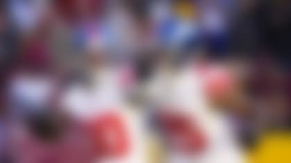 New York Giants cornerback Darnay Holmes (30) celebrates his interception with teammate cornerback Deonte Banks (25) against the Washington Commanders during the second half of an NFL football game, Sunday, Nov. 19, 2023, in Landover, Md. (AP Photo/Andrew Harnik)