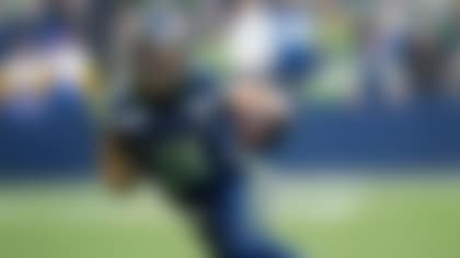 Seattle Seahawks wide receiver Jaxon Smith-Njigba (11) runs with the ball during the NFC Championship NFL football game, Sunday, Jan. 25, 2026, in Seattle. (AP Photo/Ben VanHouten)