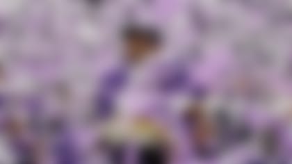 Washington quarterback Michael Penix Jr. celebrates after the Huskies' Sugar Bowl CFP NCAA semifinal victory over Texas on Monday night