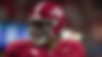Alabama offensive lineman JC Latham (65) looks on before the Southeastern Conference championship NCAA college football game against Georgia in Atlanta, Saturday, Dec. 2, 2023. (AP Photo/Mike Stewart)