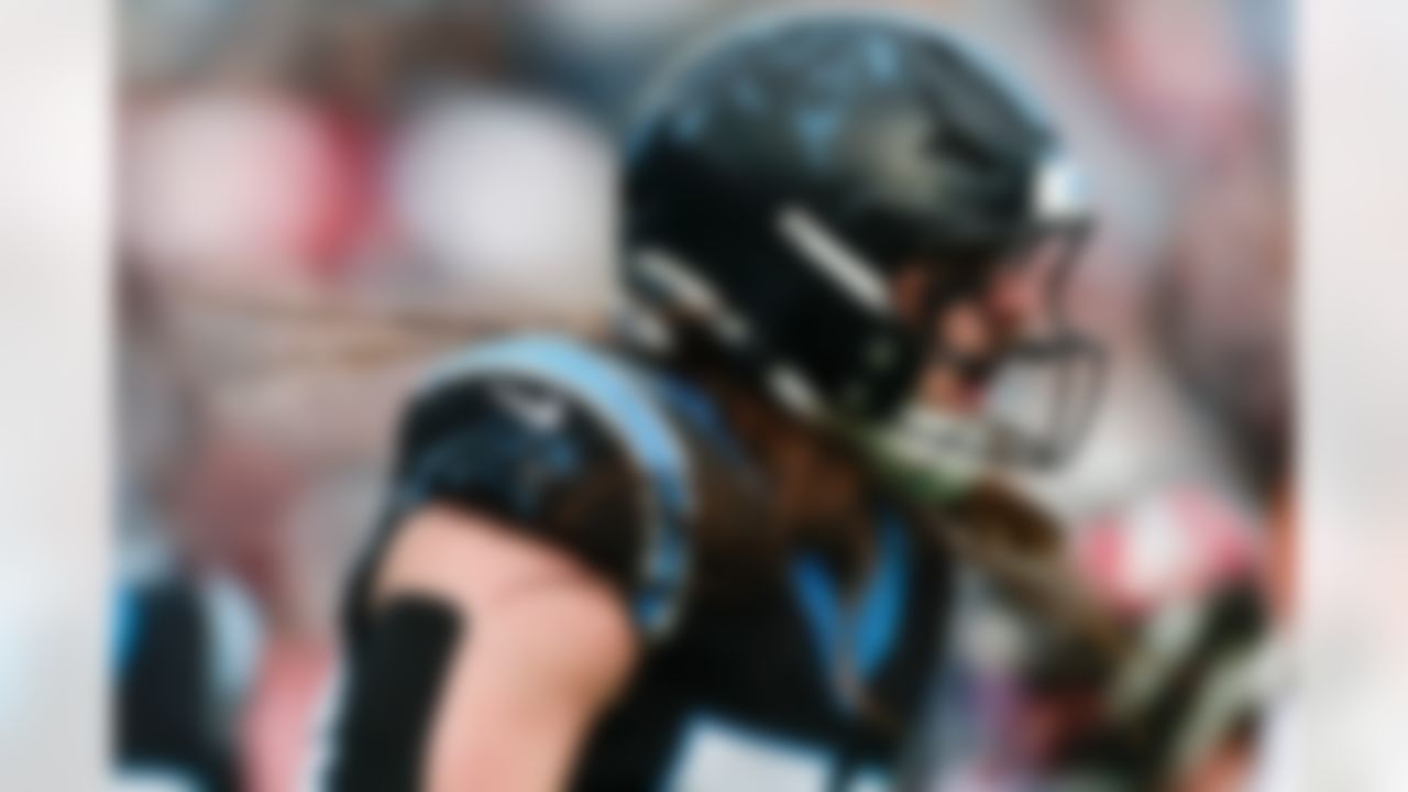 Carolina Panthers linebacker Christian Rozeboom (56) reacts after tackling Tampa Bay Buccaneers quarterback Baker Mayfield (6) during an NFL football game on Sunday, December 21, 2025 in Charlotte, North Carolina.