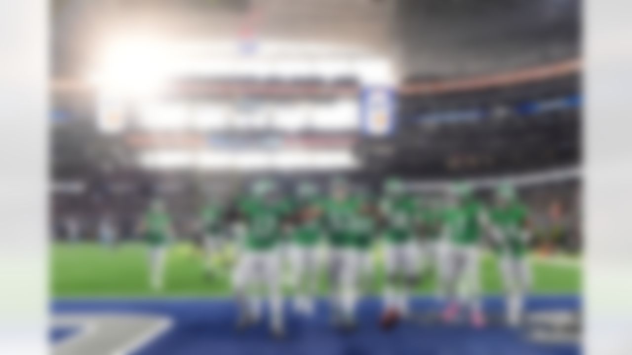 The Philadelphia Eagles celebrate after a fumble recovery by linebacker Zack Baun (53) during the first half of an NFL football game against the Dallas Cowboys, Sunday, Nov. 23, 2025, in Arlington, Texas.