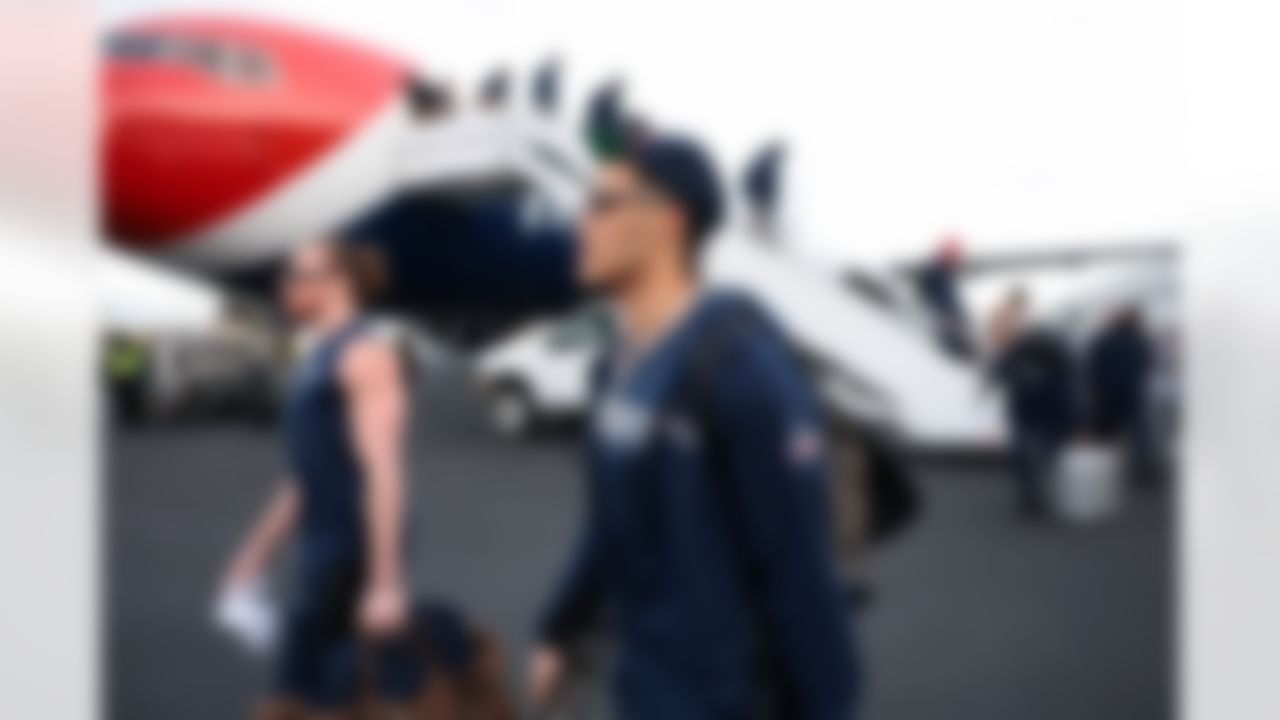 New England Patriots cornerback Christian Gonzalez (0) arrives at San Jose Mineta International Airport ahead of Super Bowl LX on Sunday, February 1, 2026 in San Jose, Calif.