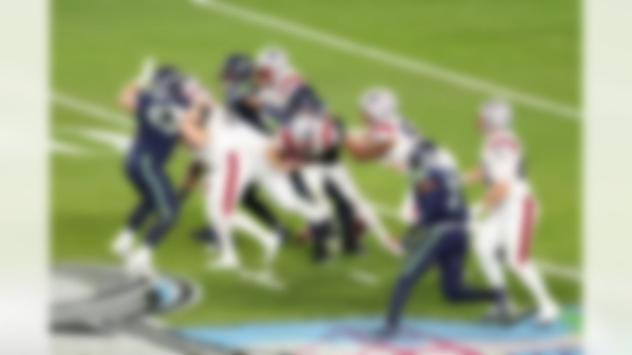 Seattle Seahawks defensive tackle Byron Murphy II (91) sacks New England Patriots quarterback Drake Maye (10) during the NFL Super Bowl LX football game on Sunday, February 8, 2026 in Santa Clara, Calif.