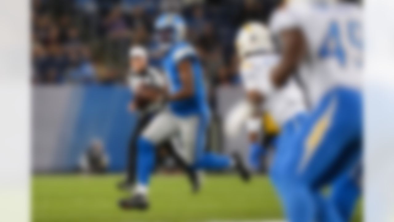 Detroit Lions quarterback Hendon Hooker (2) looks to make a pass during an NFL football game against the Los Angeles Chargers on Thursday, July 31, 2025 in Canton, Ohio.