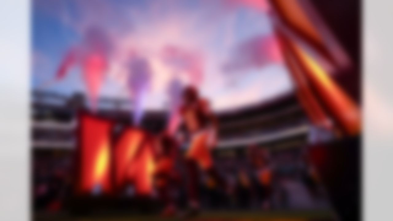 Washington Commanders safety Tyler Owens (18) runs out of the tunnel before an NFL football game against the Philadelphia Eagles on Saturday, December 20, 2025 in Landover, Maryland.