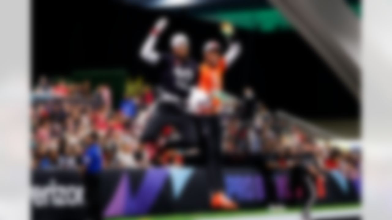 Houston Texans wide receiver Nico Collins (12) and Cincinnati Bengals wide receiver Tee Higgins (5) celebrate after a play during the 2026 Pro Bowl Game on Tuesday, February 3, 2026 in San Francisco, California.