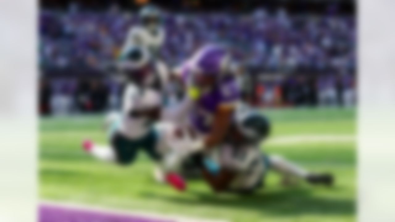 Minnesota Vikings running back Jordan Mason (27) runs the ball to score a touchdown during an NFL football game against the Philadelphia Eagles on Sunday, October 19, 2025 in Minneapolis, Minnesota.