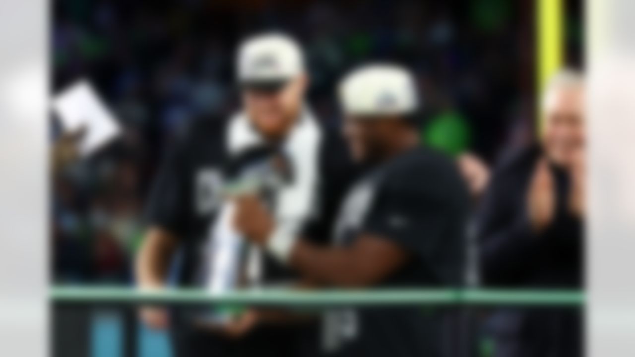 Seattle Seahawks running back Kenneth Walker III (9) and quarterback Sam Darnold (14) celebratesa win after the NFL Super Bowl LX football game against the New England Patriots on Sunday, February 8, 2026 in Santa Clara, Calif.