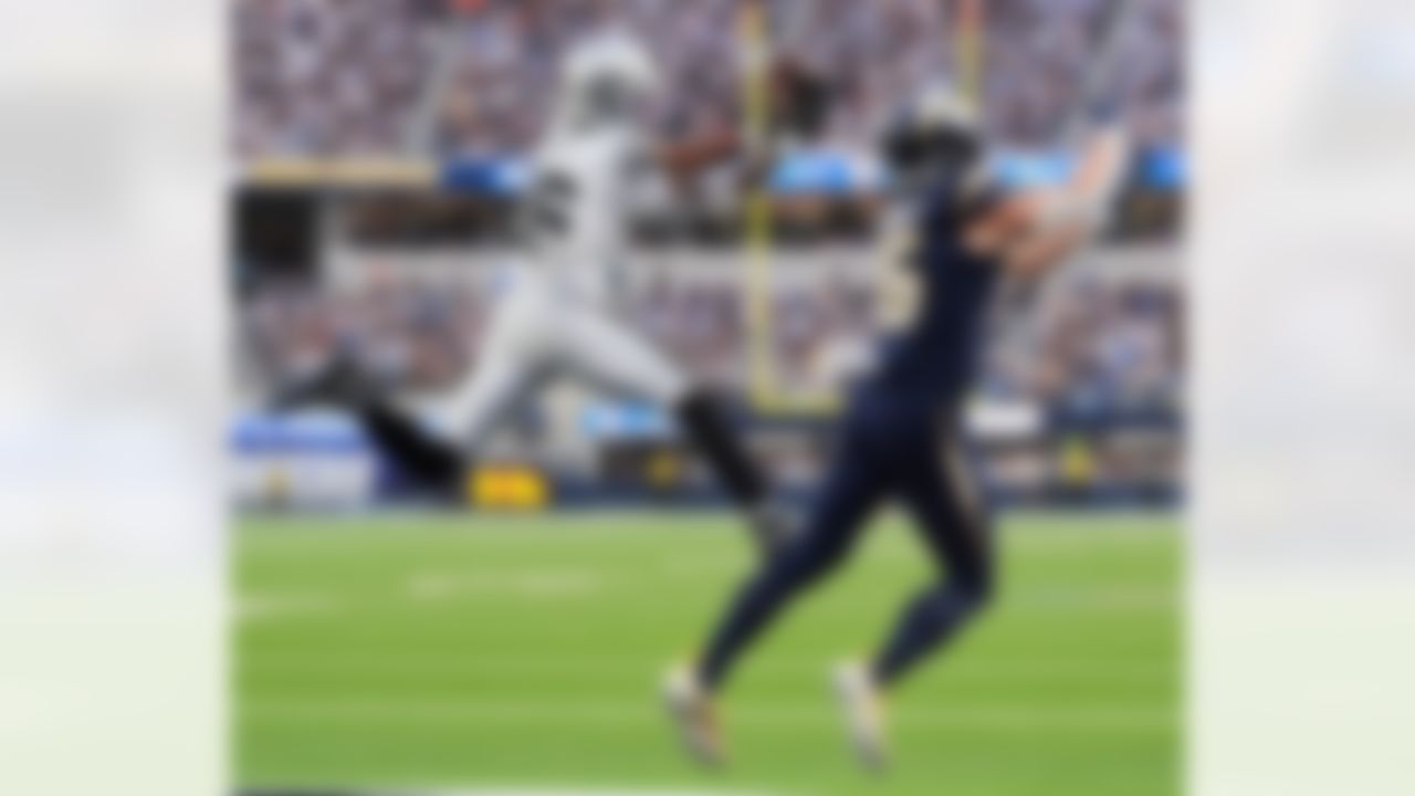 Las Vegas Raiders cornerback Kyu Blu Kelly (36) intercepts a pass intended for Los Angeles Chargers wide receiver Ladd McConkey (15) during the first half of an NFL football game, Sunday, Nov. 30, 2025, in Inglewood, Calif.