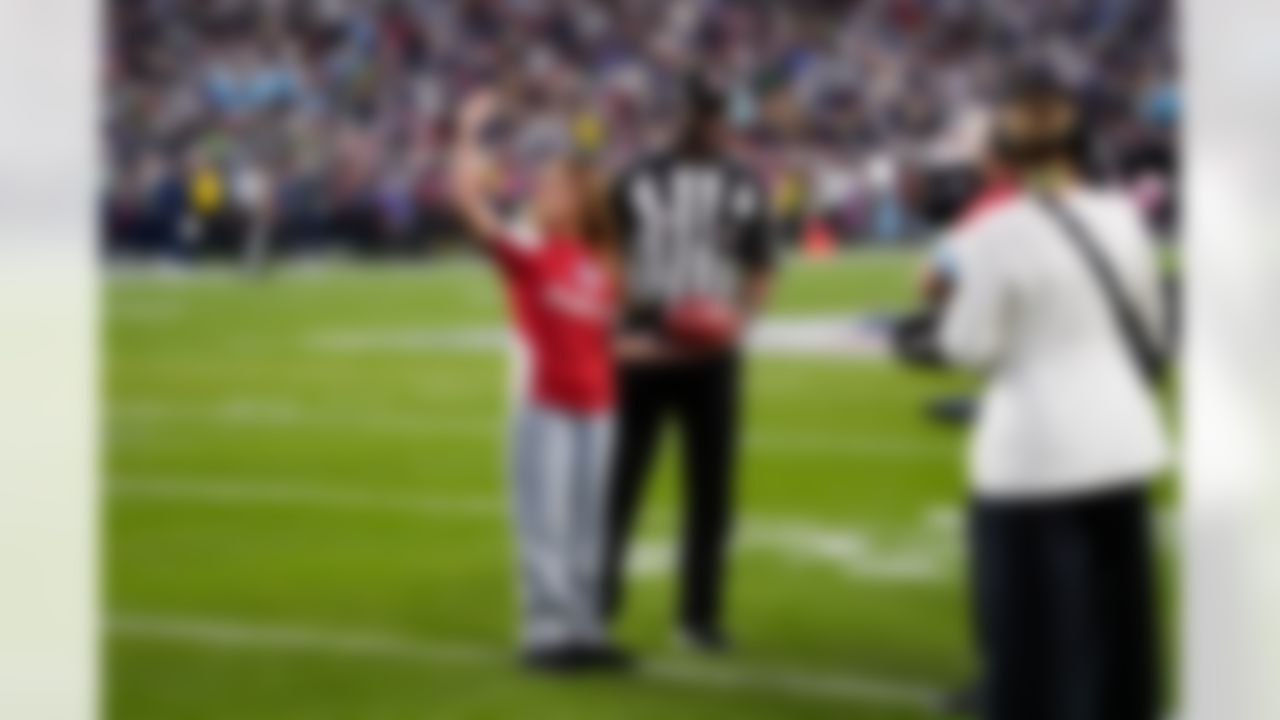 Play 60 Kid Jasmine delivers the game ball after halftime of the NFL Super Bowl LX football game between the Seattle Seahawks and the New England Patriots on Sunday, February 8, 2026 in Santa Clara, Calif.