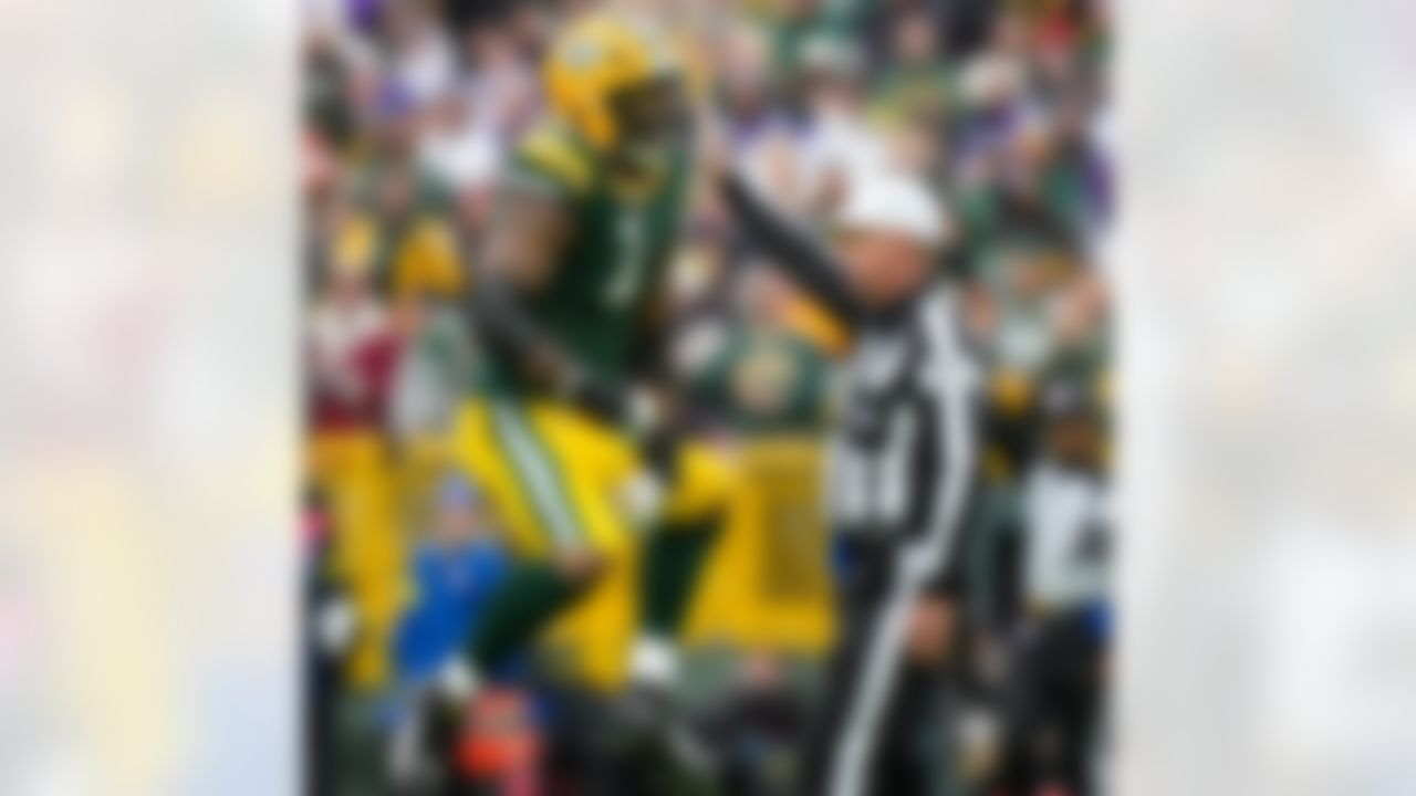 Green Bay Packers defensive end Micah Parsons (1) celebrates a tackle during an NFL football game against the Minnesota Vikings on Sunday, November 23, 2025 in Green Bay, Wisconsin.