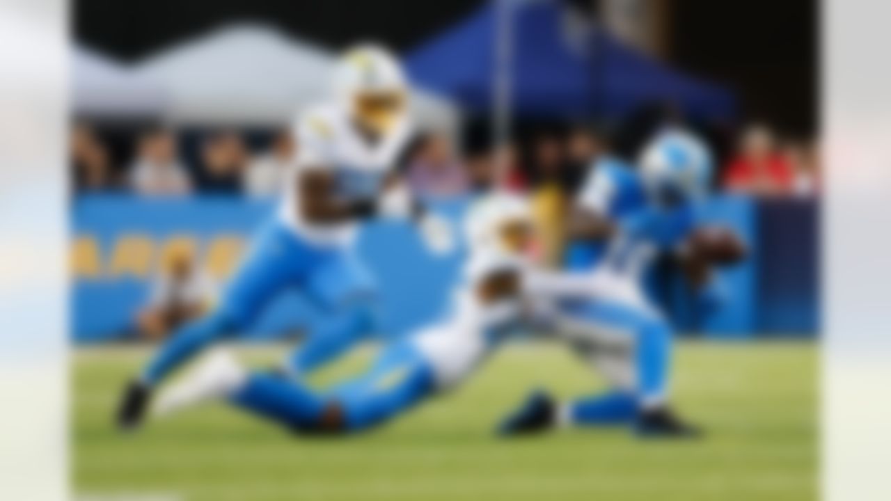 Los Angeles Chargers cornerback Nikko Reed (46) breaks up a pass intended for Detroit Lions wide receiver Dominic Lovett (19) during an NFL football game on Thursday, July 31, 2025 in Canton, Ohio.