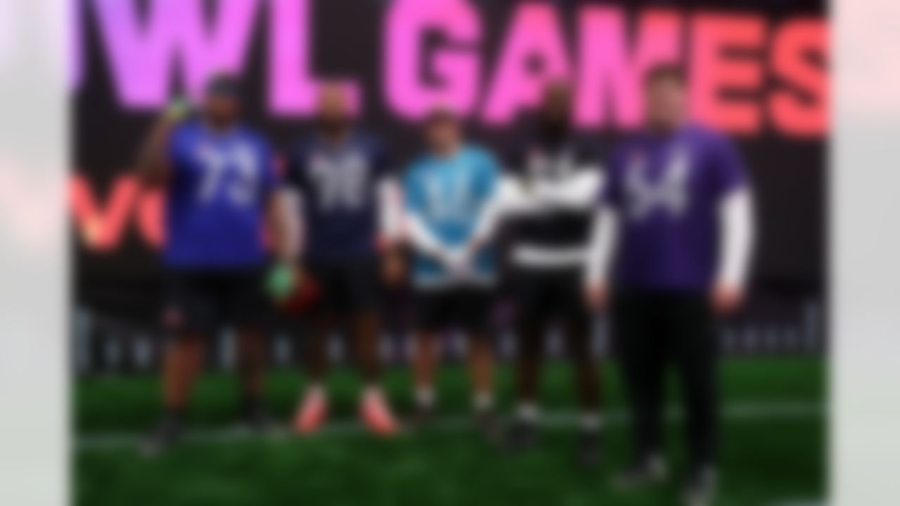 Buffalo Bills offensive tackle Dion Dawkins (73), Tennessee Titans defensive tackle Jeffery Simmons (98), Jacksonville Jaguars long snapper Ross Matiscik (46), Houston Texans defensive end Will Anderson Jr. (51) and Baltimore Ravens center Tyler Linderbaum (64) pose for a photo during the 2026 Pro Bowl Skills Challenge on Monday, February 2, 2026 in San Francisco.